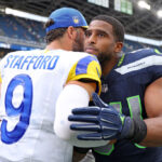 SEATTLE, WASHINGTON - SEPTEMBER 10:  Matthew Stafford #9 of the Los Angeles Rams and Bobby Wagner #54 of the Seattle Seahawks meet on the field following the Rams 30-13 win at Lumen Field on September 10, 2023 in Seattle, Washington. (Photo by Steph Chambers/Getty Images)