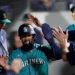 SEATTLE, WASHINGTON - SEPTEMBER 12: Teoscar Hernandez #35 of the Seattle Mariners celebrates a run against the Los Angeles Angels during the first inning at T-Mobile Park on September 12, 2023 in Seattle, Washington. (Photo by Steph Chambers/Getty Images)