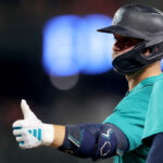 SEATTLE, WASHINGTON - SEPTEMBER 12: Ty France #23 of the Seattle Mariners celebrates his RBI single against the Los Angeles Angels during the first inning at T-Mobile Park on September 12, 2023 in Seattle, Washington. (Photo by Steph Chambers/Getty Images)