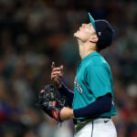 SEATTLE, WASHINGTON - SEPTEMBER 12: Bryan Woo #33 of the Seattle Mariners reacts during the fifth inning against the Los Angeles Angels at T-Mobile Park on September 12, 2023 in Seattle, Washington. (Photo by Steph Chambers/Getty Images)