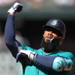 SEATTLE, WASHINGTON - SEPTEMBER 13: Teoscar Hernandez #35 of the Seattle Mariners celebrates his RBI single during the fifth inning against the Los Angeles Angels at T-Mobile Park on September 13, 2023 in Seattle, Washington. (Photo by Steph Chambers/Getty Images)