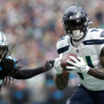 SEATTLE, WASHINGTON - SEPTEMBER 24: DK Metcalf #14 of the Seattle Seahawks catches a pass during the second quarter against the Carolina Panthers at Lumen Field on September 24, 2023 in Seattle, Washington. (Photo by Christopher Mast/Getty Images)