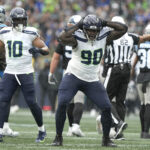 SEATTLE, WASHINGTON - SEPTEMBER 24: Jarran Reed #90 of the Seattle Seahawks celebrates after a sack during the fourth quarter against the Carolina Panthers at Lumen Field on September 24, 2023 in Seattle, Washington. (Photo by Christopher Mast/Getty Images)