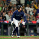 SEATTLE, WASHINGTON - SEPTEMBER 26: Josh Rojas #4 of the Seattle Mariners lines out against the Houston Astros during the third inning at T-Mobile Park on September 26, 2023 in Seattle, Washington. (Photo by Steph Chambers/Getty Images)