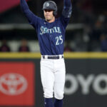 SEATTLE, WASHINGTON - SEPTEMBER 27: Dylan Moore #25 of the Seattle Mariners reacts after his double against the Houston Astros during the third inning at T-Mobile Park on September 27, 2023 in Seattle, Washington. (Photo by Steph Chambers/Getty Images)