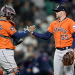 SEATTLE, WASHINGTON - SEPTEMBER 27: Martin Maldonado #15 and Ryan Pressly #55 of the Houston Astros celebrate their 8-3 win against the Seattle Mariners at T-Mobile Park on September 27, 2023 in Seattle, Washington. (Photo by Steph Chambers/Getty Images)