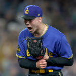SEATTLE, WASHINGTON - SEPTEMBER 29: Bryan Woo #33 of the Seattle Mariners reacts during the third inning against the Texas Rangers at T-Mobile Park on September 29, 2023 in Seattle, Washington. (Photo by Steph Chambers/Getty Images)