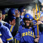 SEATTLE, WASHINGTON - SEPTEMBER 29: J.P. Crawford #3 of the Seattle Mariners reacts after his grand slam with the trident during the fourth inning against the Texas Rangers at T-Mobile Park on September 29, 2023 in Seattle, Washington. (Photo by Steph Chambers/Getty Images)