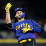 SEATTLE, WASHINGTON - SEPTEMBER 29: Eugenio Suarez #28 of the Seattle Mariners celebrates his RBI double during the third inning against the Texas Rangers at T-Mobile Park on September 29, 2023 in Seattle, Washington. (Photo by Steph Chambers/Getty Images)