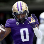 SEATTLE, WASHINGTON - OCTOBER 14: Giles Jackson #0 of the Washington Huskies celebrates a touchdown against the Oregon Ducks during the first quarter at Husky Stadium on October 14, 2023 in Seattle, Washington. (Photo by Steph Chambers/Getty Images)