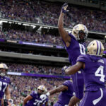 SEATTLE, WASHINGTON - OCTOBER 14: Giles Jackson #0 of the Washington Huskies celebrates a touchdown against the Oregon Ducks during the first quarter at Husky Stadium on October 14, 2023 in Seattle, Washington. (Photo by Steph Chambers/Getty Images)