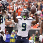 CINCINNATI, OHIO - OCTOBER 15: Kenneth Walker III #9 of the Seattle Seahawks celebrates after scoring a touchdown during the first quarter against the Cincinnati Bengals at Paycor Stadium on October 15, 2023 in Cincinnati, Ohio. (Photo by Dylan Buell/Getty Images)