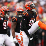CINCINNATI, OHIO - OCTOBER 15: Cam Sample #96 of the Cincinnati Bengals celebrates after a sack during the second quarter against the Seattle Seahawks at Paycor Stadium on October 15, 2023 in Cincinnati, Ohio. (Photo by Dylan Buell/Getty Images)