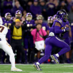 SEATTLE, WASHINGTON - OCTOBER 21: Mishael Powell #3 of the Washington Huskies intercepts a pass and scores a touchdown against the Arizona State Sun Devils during the fourth quarter at Husky Stadium on October 21, 2023 in Seattle, Washington. (Photo by Steph Chambers/Getty Images)