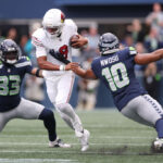 SEATTLE, WASHINGTON - OCTOBER 22: Joshua Dobbs #9 of the Arizona Cardinals carries the ball Seahawks during the first quarter of the game at Lumen Field on October 22, 2023 in Seattle, Washington. (Photo by Steph Chambers/Getty Images)