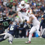 SEATTLE, WASHINGTON - OCTOBER 22: Trey McBride #85 of the Arizona Cardinals carries the ball during the fourth quarter of the game against the Seattle Seahawks at Lumen Field on October 22, 2023 in Seattle, Washington. (Photo by Steph Chambers/Getty Images)
