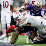 SEATTLE, WASHINGTON - NOVEMBER 11: Ja'Quinden Jackson #3 of the Utah Utes dives for a touchdown against the Washington Huskies during the second quarter at Husky Stadium on November 11, 2023 in Seattle, Washington. (Photo by Steph Chambers/Getty Images)