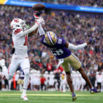 SEATTLE, WASHINGTON - NOVEMBER 11: Vincent Nunley #28 of the Washington Huskies breaks up a pass for Money Parks #10 of the Utah Utes during the second quarter at Husky Stadium on November 11, 2023 in Seattle, Washington. (Photo by Steph Chambers/Getty Images)