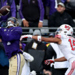 SEATTLE, WASHINGTON - NOVEMBER 11: Rome Odunze #1 of the Washington Huskies catches a touchdown pass against Tao Johnson #15 of the Utah Utes during the second quarter at Husky Stadium on November 11, 2023 in Seattle, Washington. (Photo by Steph Chambers/Getty Images)