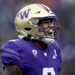 SEATTLE, WASHINGTON - NOVEMBER 11: Michael Penix Jr. #9 of the Washington Huskies celebrates a touchdown against the Utah Utes during the third quarter at Husky Stadium on November 11, 2023 in Seattle, Washington. (Photo by Steph Chambers/Getty Images)