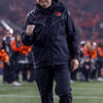 CORVALLIS, OREGON - NOVEMBER 18: Oregon State Beavers Head Coach Johnathan Smith walks on the field before their game against the Washington Huskies at Reser Stadium on November 18, 2023 in Corvallis, Oregon. (Photo by Tom Hauck/Getty Images)
