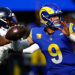 INGLEWOOD, CALIFORNIA - NOVEMBER 19: Matthew Stafford #9 of the Los Angeles Rams passes the ball during the first quarter against the Seattle Seahawks at SoFi Stadium on November 19, 2023 in Inglewood, California. (Photo by Ronald Martinez/Getty Images)