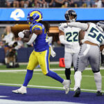 INGLEWOOD, CALIFORNIA - NOVEMBER 19: Darrell Henderson Jr. #27 of the Los Angeles Rams runs the ball for a touchdown in the game against the Seattle Seahawks during the fourth quarter at SoFi Stadium on November 19, 2023 in Inglewood, California. (Photo by Sean M. Haffey/Getty Images)