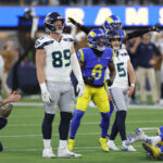 INGLEWOOD, CALIFORNIA - NOVEMBER 19: Tre Tomlinson #6 of the Los Angeles Rams reacts as Jason Myers #5 of the Seattle Seahawks misses a field goal during the fourth quarter at SoFi Stadium on November 19, 2023 in Inglewood, California. (Photo by Sean M. Haffey/Getty Images)