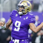 LAS VEGAS, NEVADA - DECEMBER 01: Michael Penix Jr. #9 of the Washington Huskies attempts a pass during the first quarter against the Oregon Ducks during the Pac-12 Championship at Allegiant Stadium on December 01, 2023 in Las Vegas, Nevada. (Photo by Ian Maule/Getty Images)