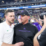 LAS VEGAS, NEVADA - DECEMBER 01: Head coach Dan Lanning of the Oregon Ducks and head coach Kalen DeBoer of the Washington Huskies hug after Washington's win 34-31 during the Pac-12 Championship at Allegiant Stadium on December 01, 2023 in Las Vegas, Nevada. (Photo by Ian Maule/Getty Images)