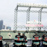 SEATTLE, WASHINGTON - DECEMBER 31: The Seattle Kraken look on during practice before the Discover NHL Winter Classic at T-Mobile Park on December 31, 2023 in Seattle, Washington. (Photo by Steph Chambers/Getty Images)