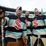 SEATTLE, WASHINGTON - DECEMBER 31: Philipp Grubauer #31, Chris Driedger #60 and Joey Daccord #35 of the Seattle Kraken pose for a photo during practice before the Discover NHL Winter Classic at T-Mobile Park on December 31, 2023 in Seattle, Washington. (Photo by Steph Chambers/Getty Images)