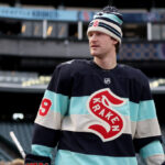 SEATTLE, WASHINGTON - DECEMBER 31: Jared McCann #19 of the Seattle Kraken looks on during practice before the Discover NHL Winter Classic at T-Mobile Park on December 31, 2023 in Seattle, Washington. (Photo by Steph Chambers/Getty Images)