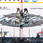 SEATTLE, WASHINGTON - JANUARY 01:  Jack Eichel #9 of the Vegas Golden Knights and Alex Wennberg #21 of the Seattle Kraken compete for the opening face-off during the first period at T-Mobile Park on January 01, 2024 in Seattle, Washington. (Photo by Alika Jenner/Getty Images)