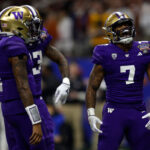NEW ORLEANS, LOUISIANA - JANUARY 01: Dillon Johnson #7 of the Washington Huskies celebrates after a touchdown during the first quarter against the Texas Longhorns during the CFP Semifinal Allstate Sugar Bowl at Caesars Superdome on January 01, 2024 in New Orleans, Louisiana. (Photo by Sean Gardner/Getty Images)