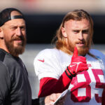LAS VEGAS, NEVADA - FEBRUARY 08:  George Kittle #85 and tight ends coach Brian Fleury during San Francisco 49ers practice ahead of Super Bowl LVIII at Fertitta Football Complex on February 08, 2024 in Las Vegas, Nevada. (Photo by Chris Unger/Getty Images)