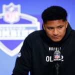 INDIANAPOLIS, INDIANA - MARCH 02: Sataoa Laumea #OL42 of the Utah Utes speaks to the media during the 2024 NFL Combine at the Indiana Convention Center on March 02, 2024 in Indianapolis, Indiana. (Photo by Justin Casterline/Getty Images)