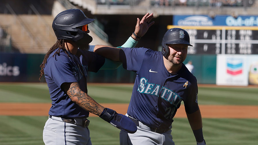 Seattle Mariners J.P. Crawford and Cal Raleigh...