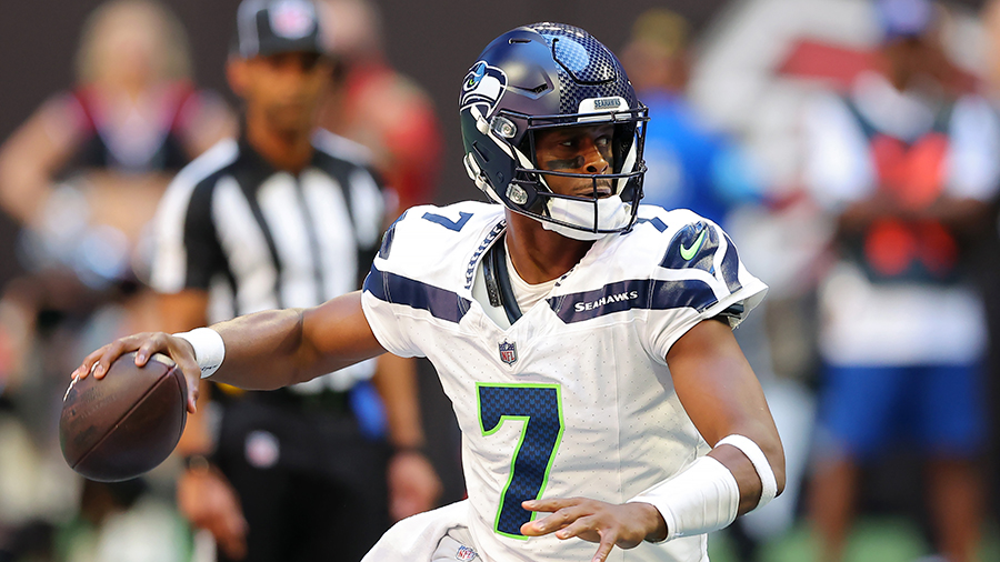 Seattle Seahawks Geno Smith looks to pass Atlanta Falcons 2024...