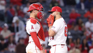 AL West-leading Rangers acquire catcher, reliever in trade with Angels