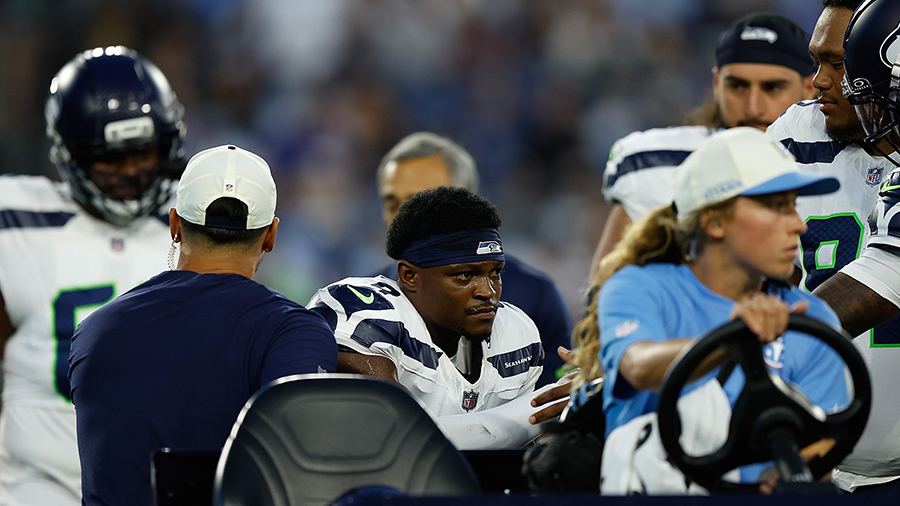Seattle Seahawks Bud Clark carted off preseason Titans 2026...