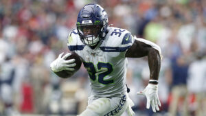 Ex-Seahawks RB Chris Carson joins Redmond H.S. coaching staff