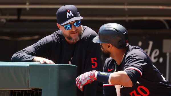 Seattle Mariners Rocco Baldelli Minnesota Twins talks with Carlos Santana 2024