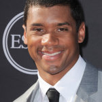 NFL player Russell Wilson arrives at the ESPY Awards on Wednesday, July 17, 2013, at Nokia Theater in Los Angeles. (Photo by Jordan Strauss/Invision/AP)