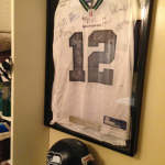 Michael Stentz Jr.'s prized possessions include a Seahawks jersey autographed by players and coaches over the past several years.