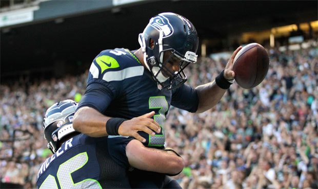 Russell Wilson and the Seahawks scored on their first five drives en route to a 34-6 win over Chica...