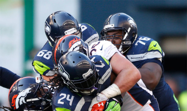 Marshawn Lynch has 52 carries through three games compared to 10 for Robert Turbin and none for Chr...