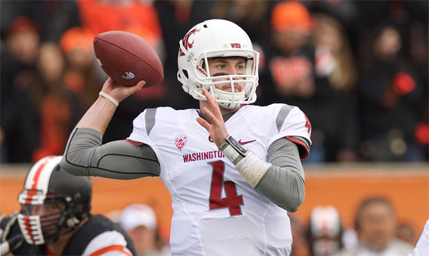 Luke Falk says Washington State's improved running game forces opponents to defend them differently...