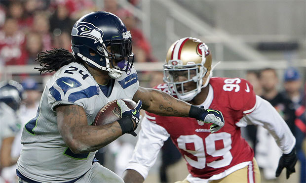 Marshawn Lynch reached triple digits rushing for the fifth time in eight games against the 49ers si...