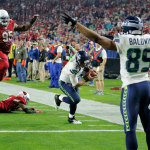 2. Russell Wilson's 5-yard touchdown run, Week 16 at Arizona: Russell Wilson seemed dead to rights when he rolled out to his left on a play-action bootleg and had an unblocked defender closing in on him. But Wilson evaded him with a hesitation, then a stiff-arm, before juking another defender on his way to the end zone.